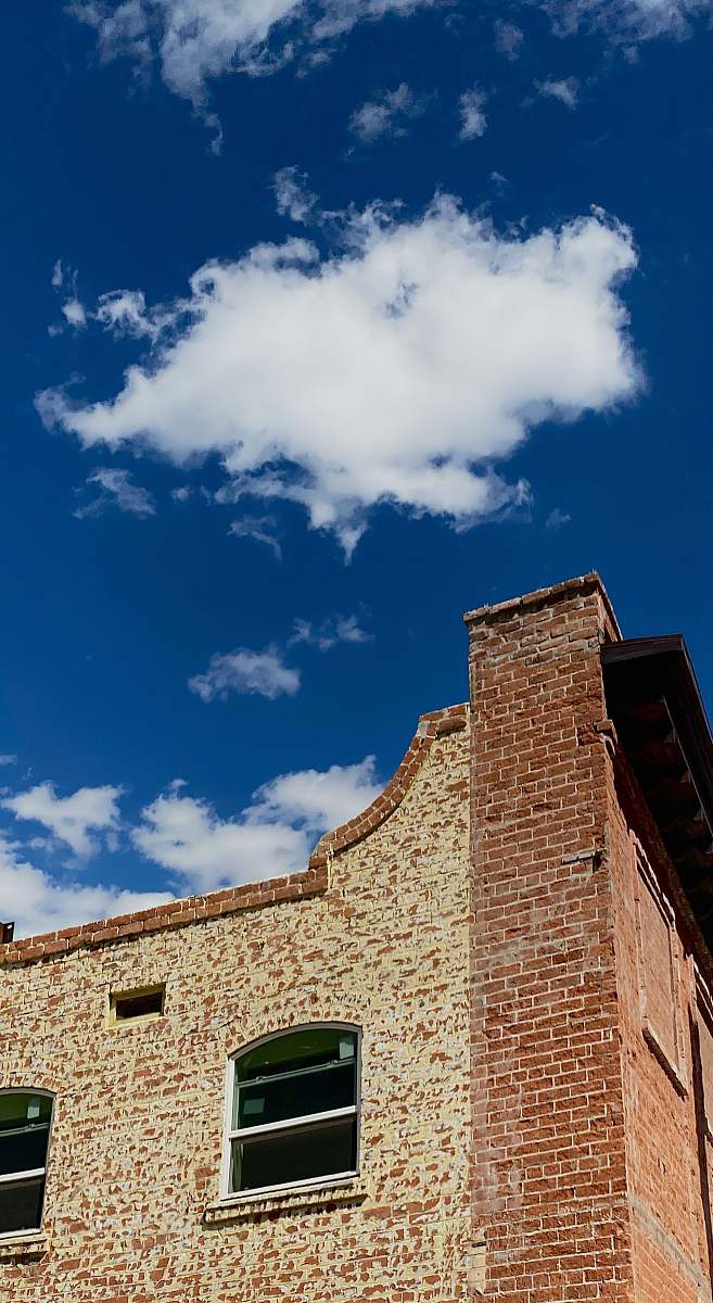 110 e congress st brown brick building under blue sky and white clouds during daytime tucson